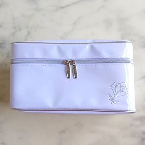 NWT. Lancome Large White Cosmetic Bag with Silver Trim, Handle and Carved Logo.